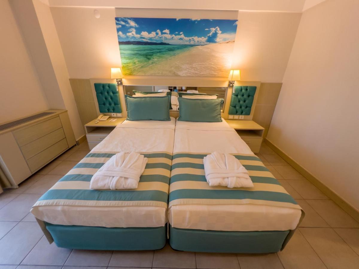 מלון קמר Aqi Hydros Club מראה חיצוני תמונה A bedroom at the hotel